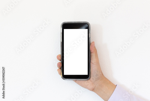 Closeup hand using smart phone, young man using mobile phone with white screen, insert text