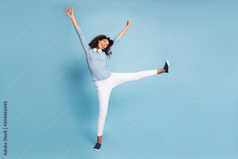 Full length body size photo of cheerful positive cute pretty sweet girlfriend in white trousers rejoicing in weekends started isolated blue pastel color background