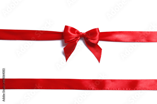 Red ribbon and bow isolated on a white background