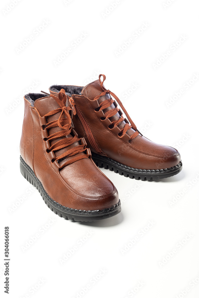 brown demi boots on white background