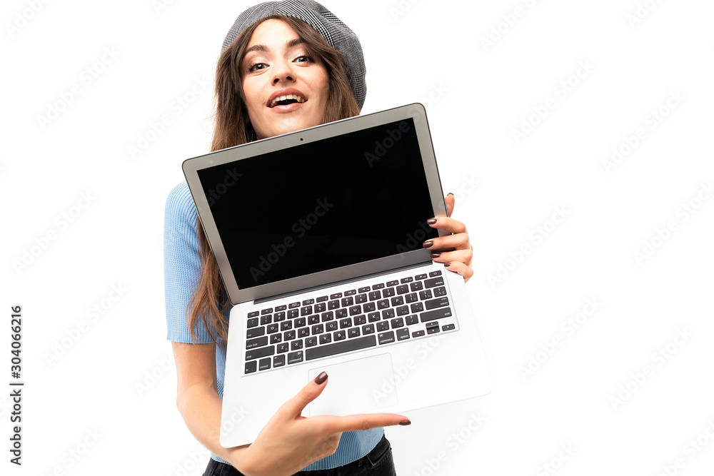 Caucasian female with laptop and smiles, picture isolated on white background Caucasian female with laptop and smiles, picture isolated on white background