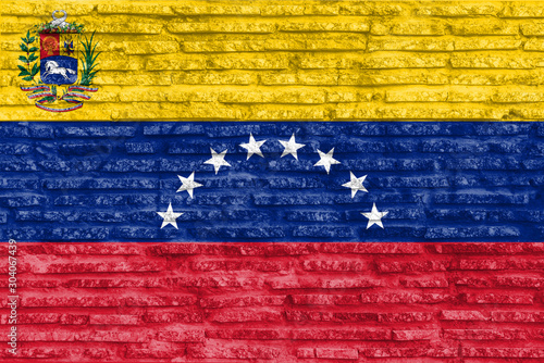 Colorful painted national flag of Venezuela on old brick wall. Illustration.