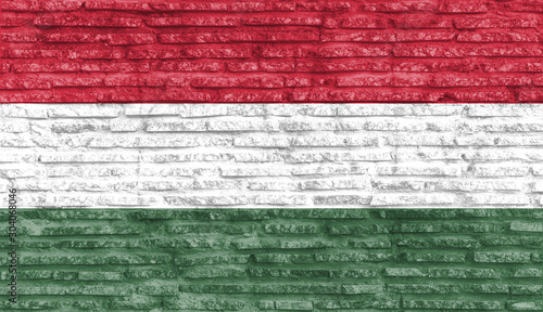Colorful painted national flag of Hungary on old brick wall. Illustration.