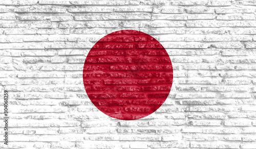 Colorful painted national flag of Japan on old brick wall. Illustration.
