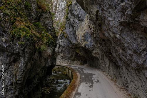 Road passing through rocks in the mountain 