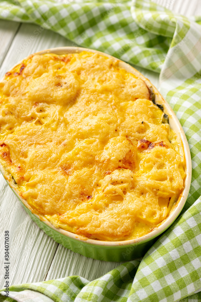Potato, spinach and feta cheese casserole. Potato, spinach and feta cheese casserole.