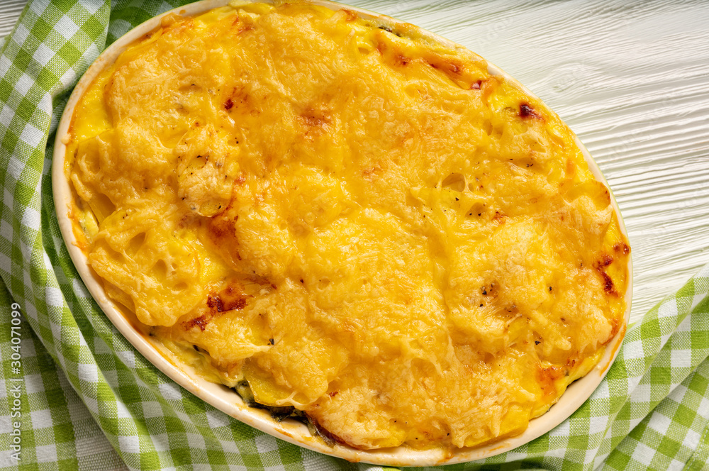Potato, spinach and feta cheese casserole. Potato, spinach and feta cheese casserole.