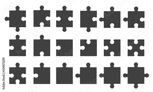 Set black puzzle pieces isolated photo
