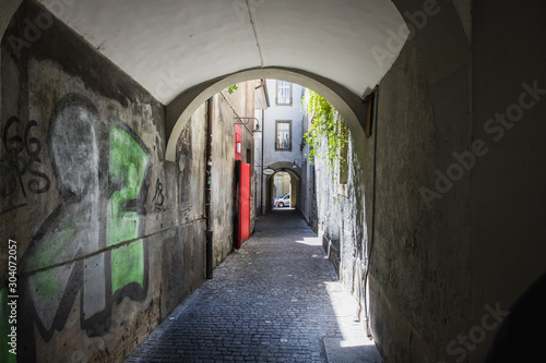Graffiti in alley, Switzerland © alexandernative