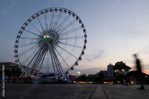 Ferris wheel in Asiatique The Riverfront at dusk on January 13, 2019 in Bangkok, Thailand
