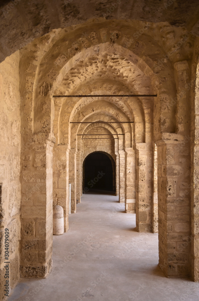 Stone arches in the corridor of Ribat Citadel, Sousse, Tunisia.