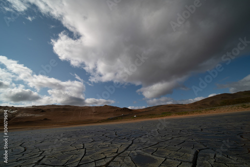 Dried land in the desert. Cracked soil crust