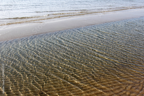 coastal waves and sand