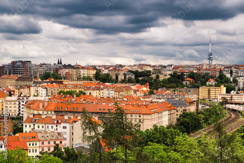 Aerial view of  Praha (Prague), Czech. Prague is colorful and beautiful European city.Beautiful view of the architecture of Prague in the Czech. Dramatic sky background. © Elena Milovzorova