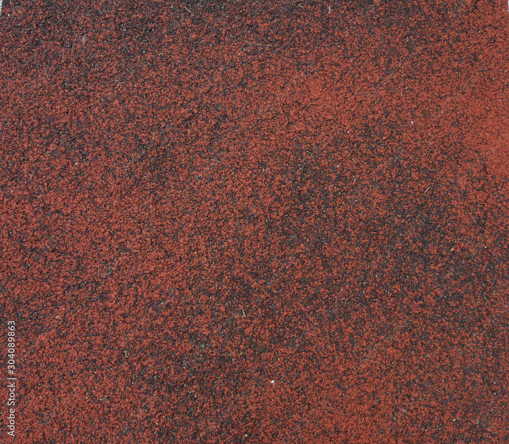 The typical racing track is covered by the old rubber in the stadium The typical racing track is covered by the old rubber in the stadium
