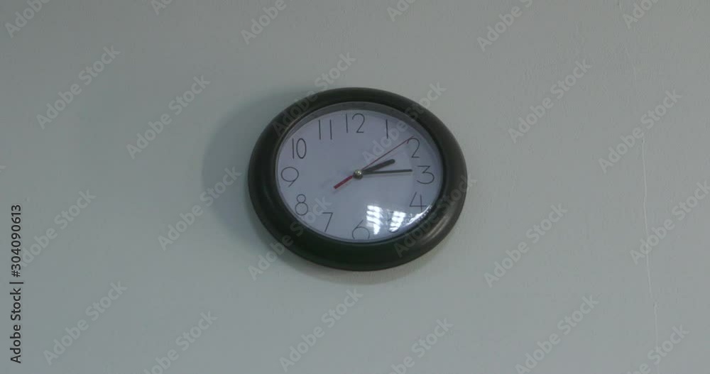 Wall round clock black and white with number and clockwise o'clock straight out or finish working and after school on vintage white wall