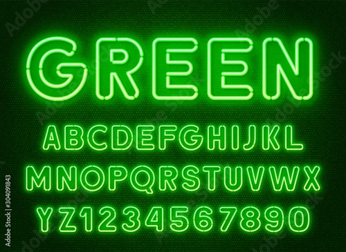 Neon rounded green font, glowing alphabet with numbers. on a dark background.
