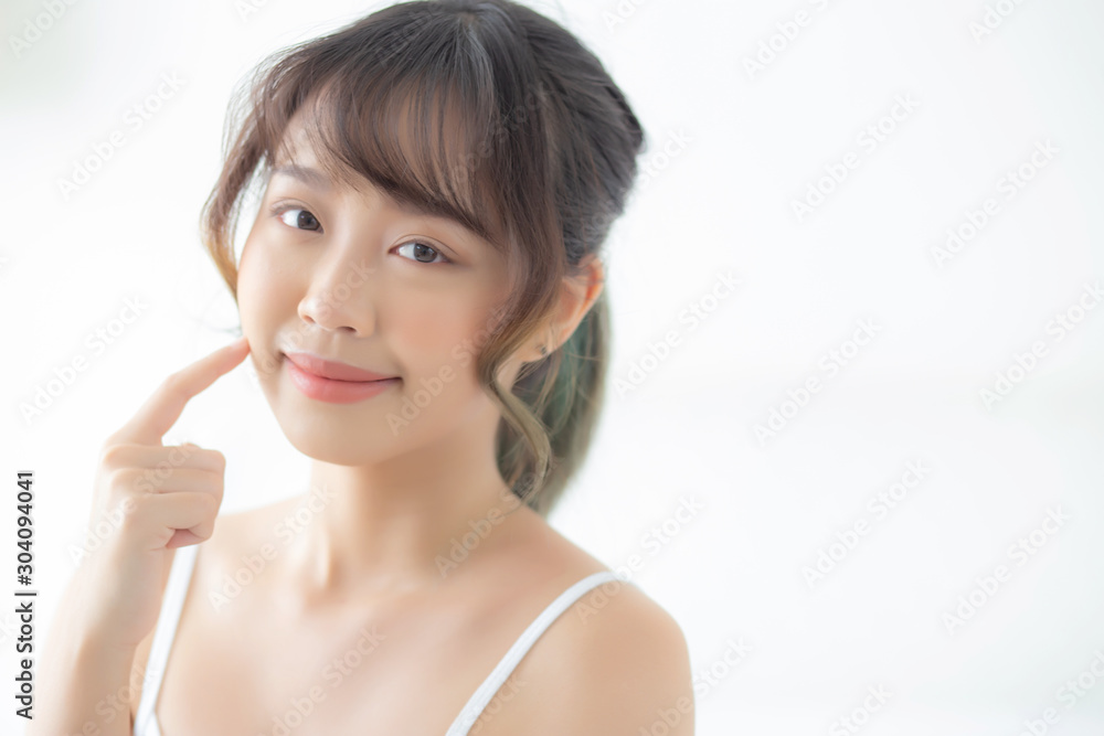 Portrait of beautiful young asian woman smile while wake up healthy and wellness with sunrise at morning in the bedroom, asia girl skin care with happy with fresh, lifestyle and relax concept. Portrait of beautiful young asian woman smile while wake up healthy and wellness with sunrise at morning in the bedroom, asia girl skin care with happy with fresh, lifestyle and relax concept.