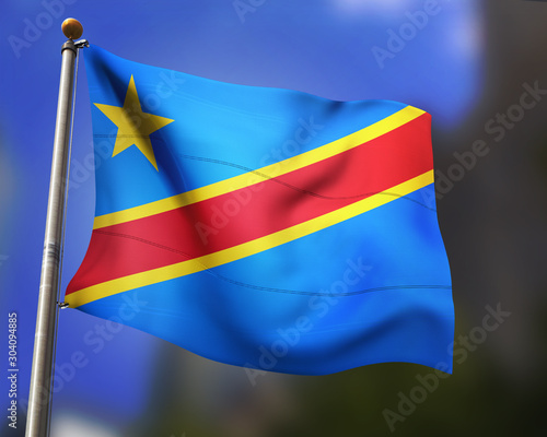 Flag of the Democratic Republic of the Congo waving in blue sky photo