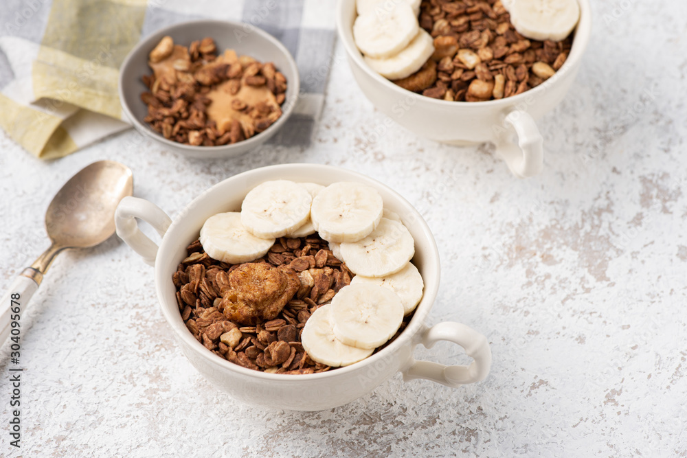 Granola, oatmeal with banana food background Granola, oatmeal with banana food background