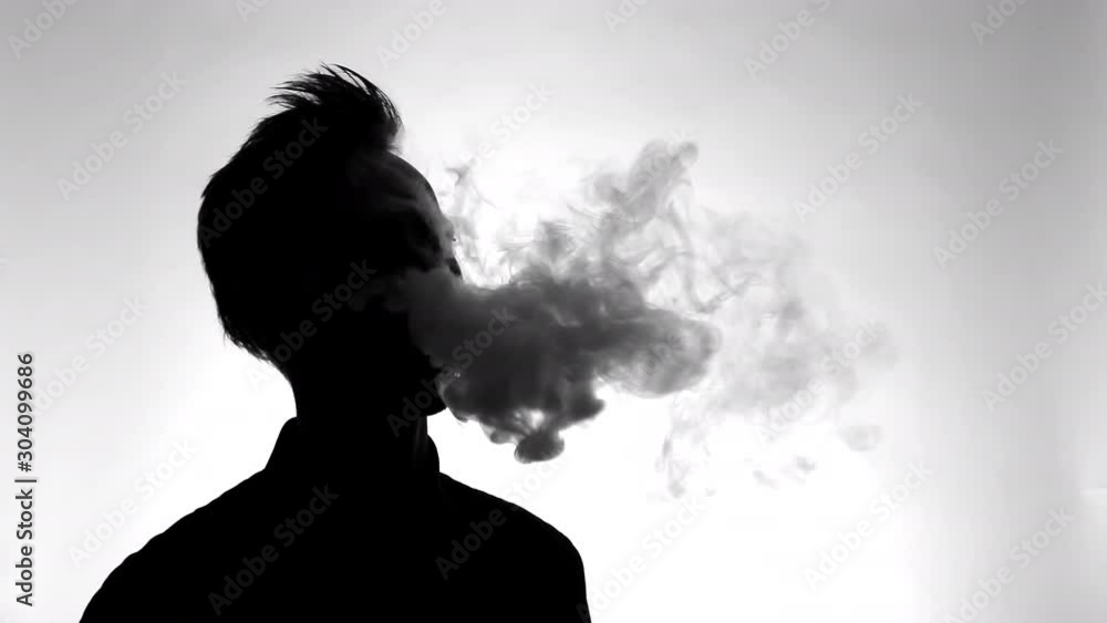silhouette of man using an electric cigarette silhouette of man using an electric cigarette