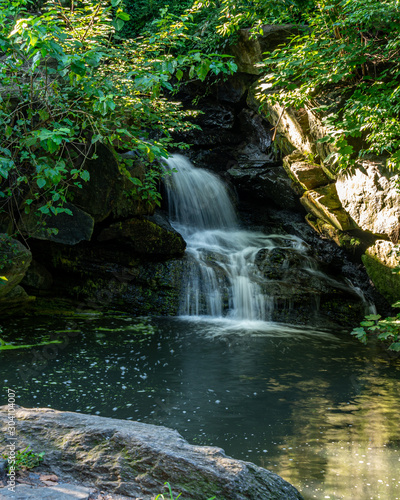 Fototapeta Naklejka Na Ścianę i Meble -  Waterfall at Glen Span Arch Central Park