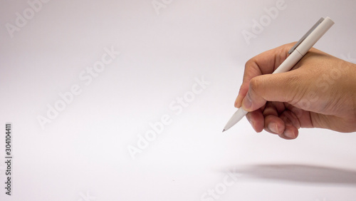right hand is writing on white background, clear screen for drawing, space area for new concept, Please fill in personal data, complete an application form, put down one's name