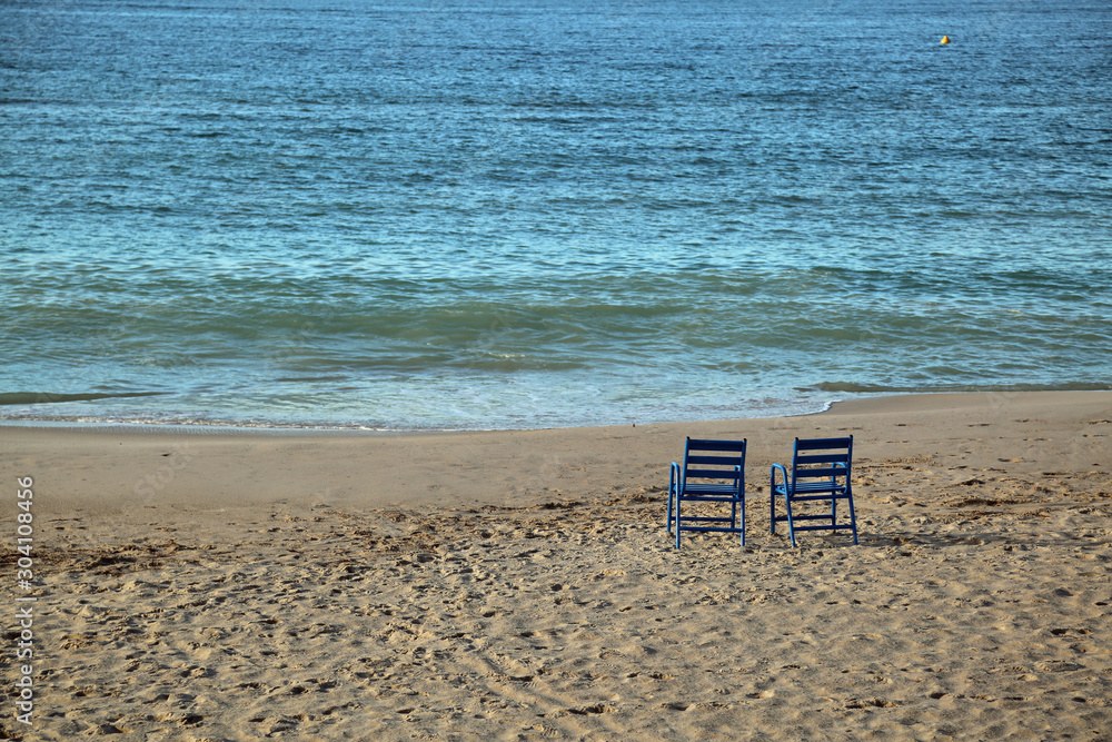 Blue chairs on the beach Blue chairs on the beach