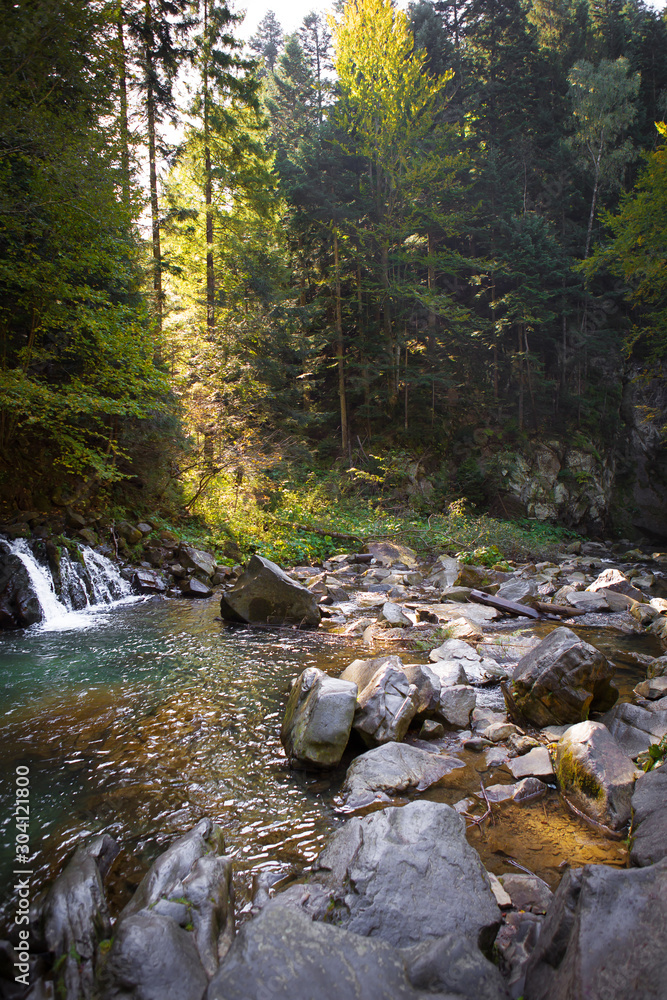 Very beautiful waterfall in autumn in the forest. Ukraine, Carpathians Very beautiful waterfall in autumn in the forest. Ukraine, Carpathians