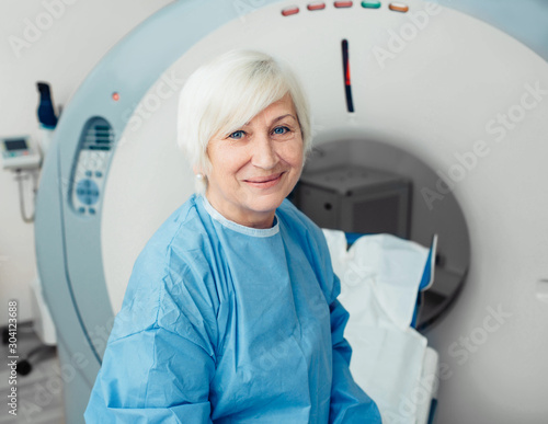 Senior patient at a computer tomography exam photo