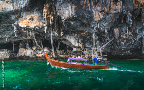 Beautiful nature scenic landscape of Viking cave with boat for traveler Phi Phi island Krabi Adventure lifestyle travel Phuket Thailand Tourist on holiday vacation trips Tourism destination place Asia
