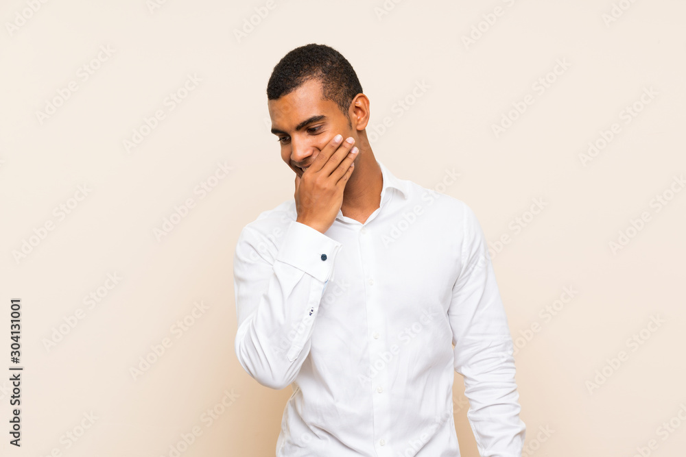Young handsome brunette man over isolated background smiling a lot Young handsome brunette man over isolated background smiling a lot