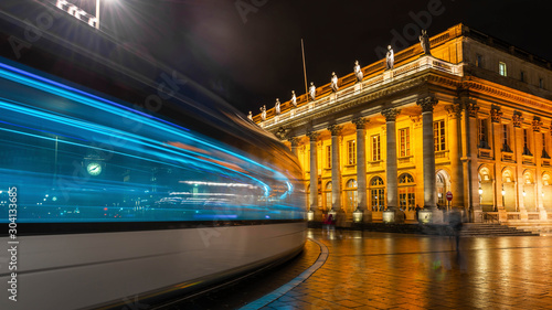 Tram passing the Grand Théâtre de Bordeaux at night in Gironde in New Aquitaine, France