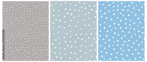 Cute White Stars and Dots Seamless Vector Patterns. Tiny Stars Isolated on a Blue and Gray Background. Simple Infantile Sky Design. Delicate Dotted Vector Print Ideal for Fabric, Card, Layout.