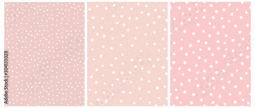 Cute White Stars and Dots Seamless Vector Patterns. Tiny Stars Isolated on a Pink Background.Light Pastel Pink Simple Infantile Sky Design.Delicate Dotted Vector Print Ideal for Fabric, Card, Layout.