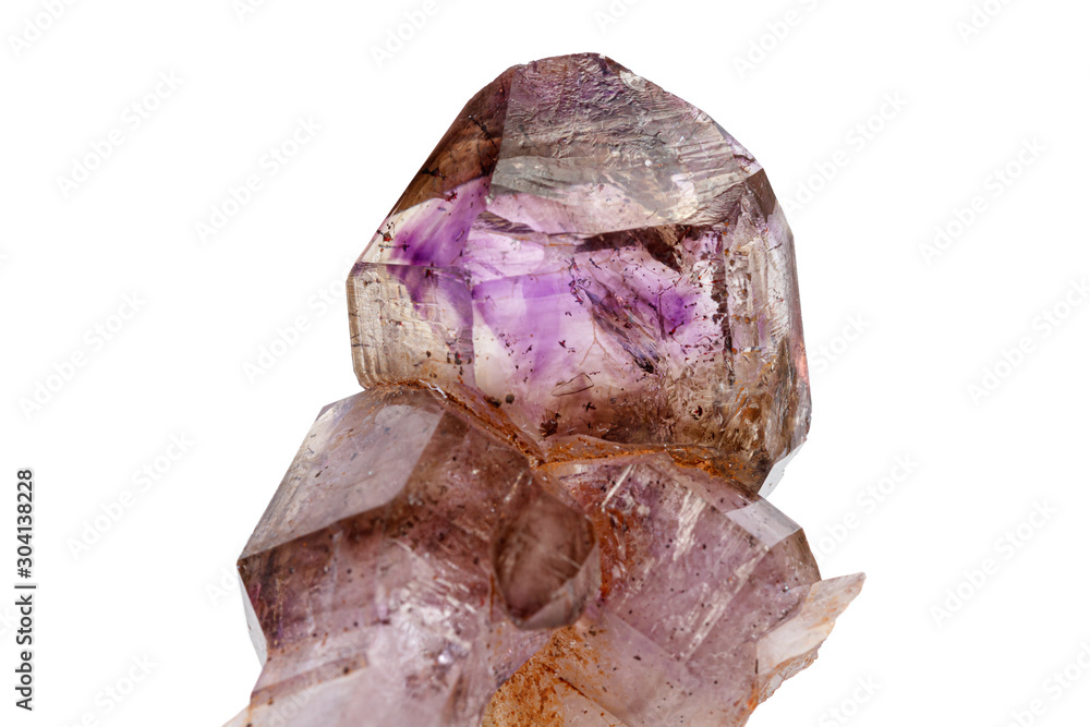 macro mineral stone Amethyst on smoky quartz on a white background macro mineral stone Amethyst on smoky quartz on a white background