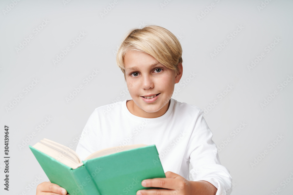 Сute little blonde boy wearing sweatshirt standing Сute little blonde boy wearing sweatshirt standing