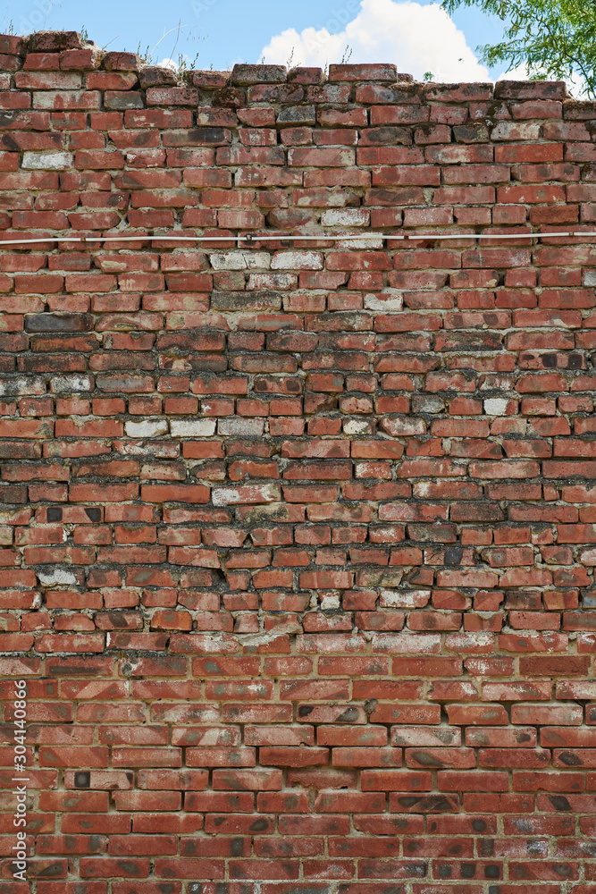 Naklejka premium Red brick wall texture grunge background