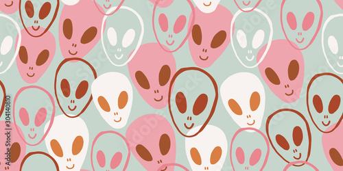 Childish seamless pattern with aliens faces ufo