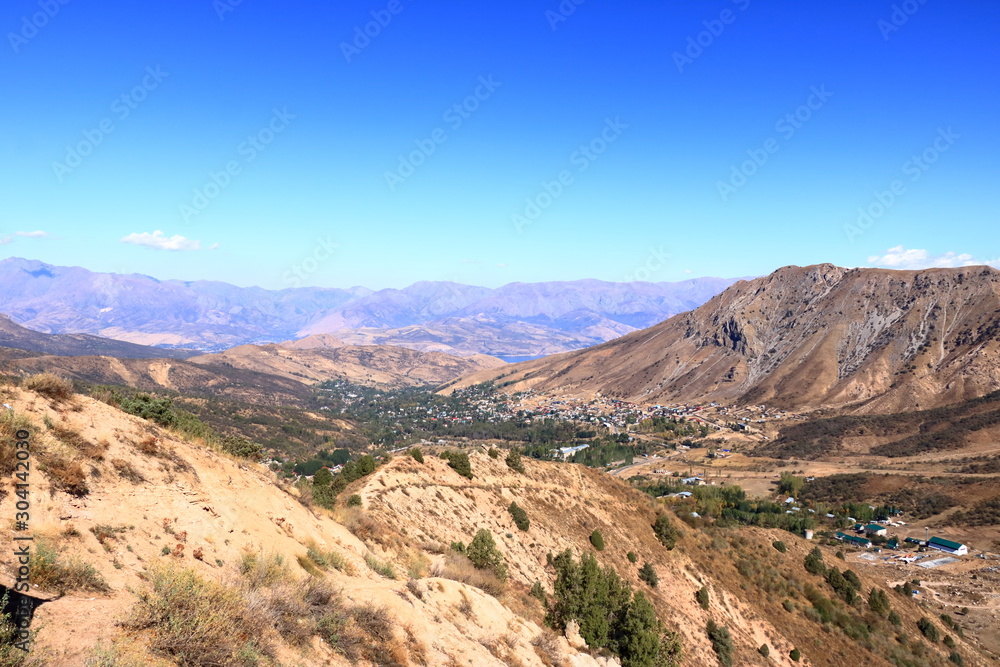 Scenic landscape of Tian Shan mountain range near Chimgan in Uzbekistan