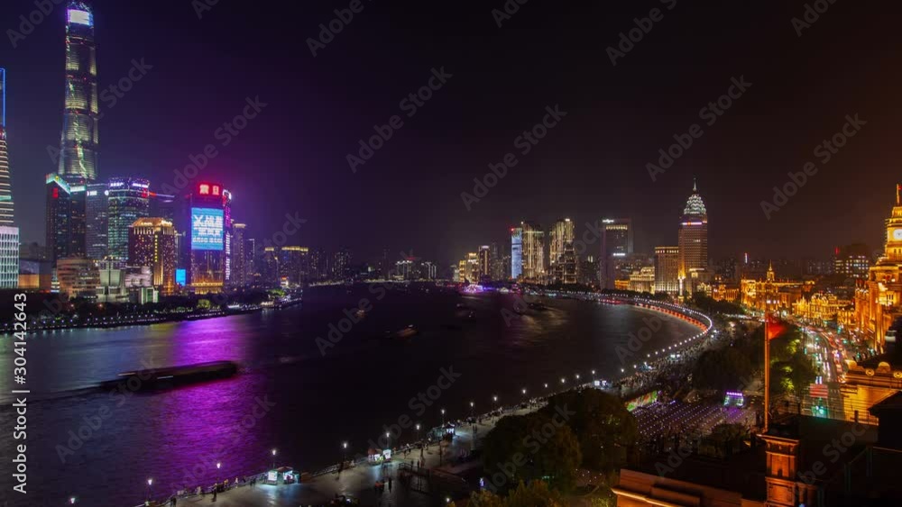 Shanghai huangpu river urban cityscape aerial skyline panorama timelapse at night zoom out