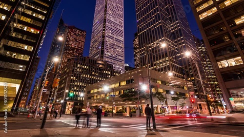 Busy street in Toronto business & financial district day to night time lapse