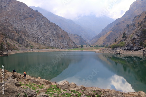 Picturesque Urungach lake in mountains on early autumn in Uzbekistan photo