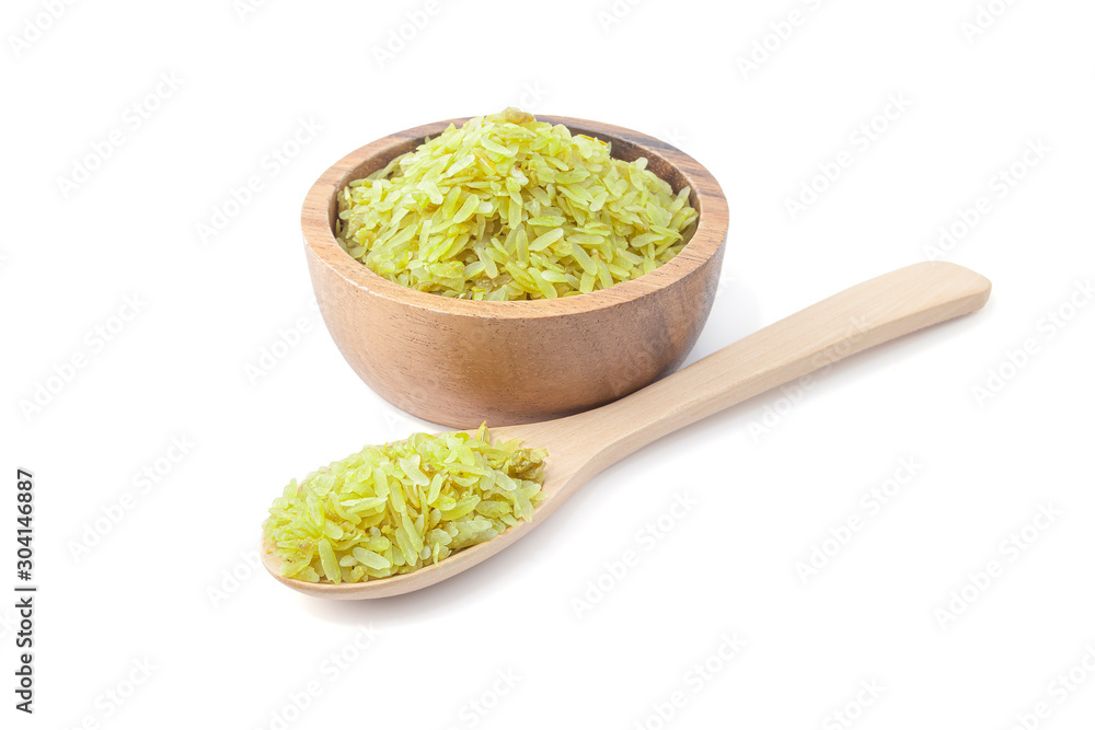 Pounded unripe rice in wooden bowl and wooden spoon isolated on white background with clipping path Pounded unripe rice in wooden bowl and wooden spoon isolated on white background with clipping path