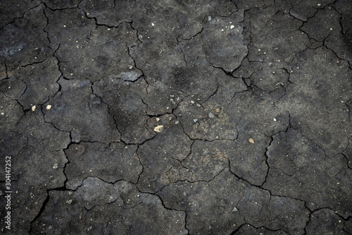 Black cracked surface top view
