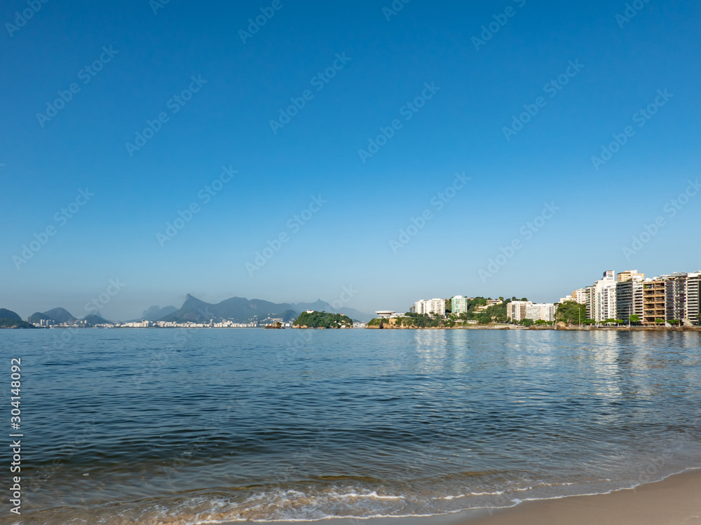 Sugar Loaf Mountain, Corcovado, Museum of Contemporary Art  on the horizon, front view, Icaraí, in the city of Niterói, Rio de Janeiro, Brazil. Beautiful landscape.