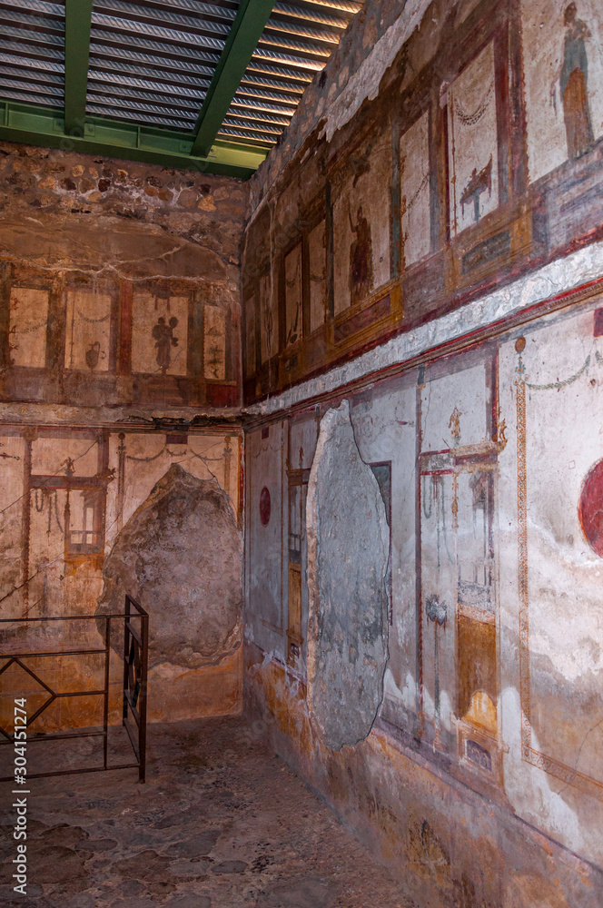 Pompeii, the best preserved archaeological site in the world, with houses, squares and historical remains of the Roman Empire. Frescoes on the interior wall at home.