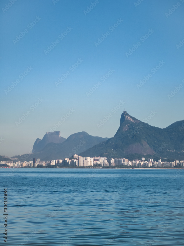 Sugar Loaf Mountain, Corcovado, on the horizon, front view, Icaraí, in the city of Niterói, Rio de Janeiro, Brazil. Beautiful landscape.