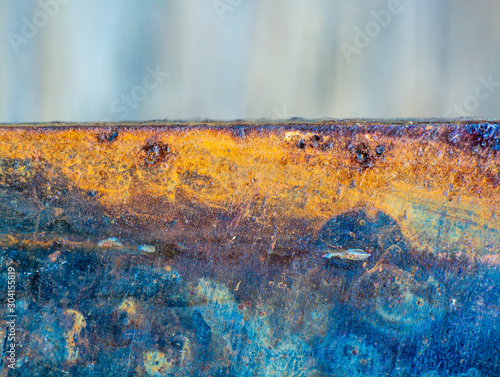 Rusty knives texture with streaks of rust. .old sheet of iron covered with rust and corrosion paint.