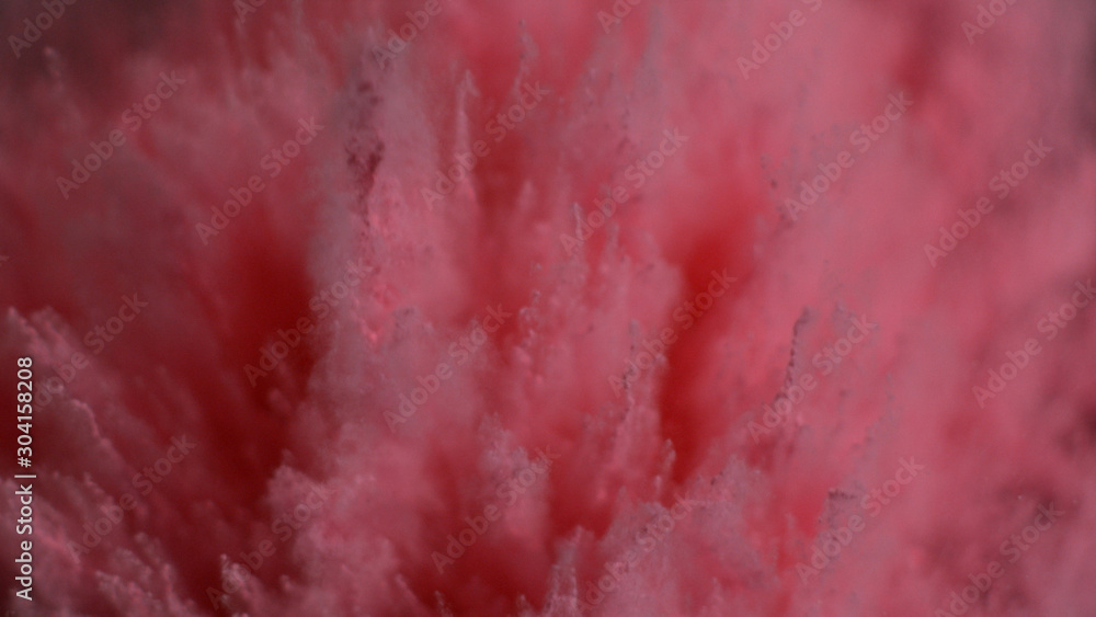Explosion of pink powdered paint